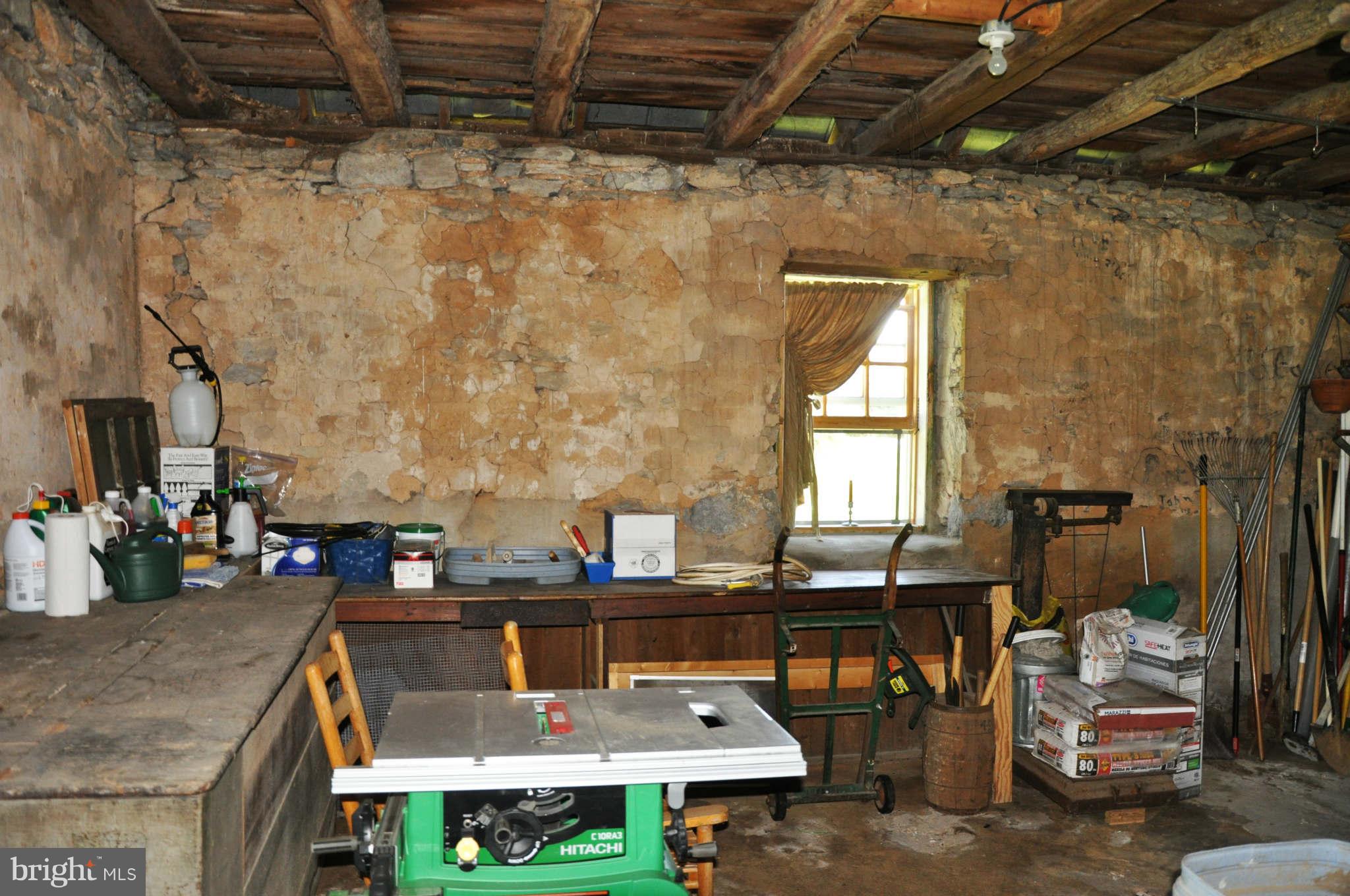2985 Summit Point Road Summit Point, WV 25446 - Photo 22 of 30 a living room with furniture and a window