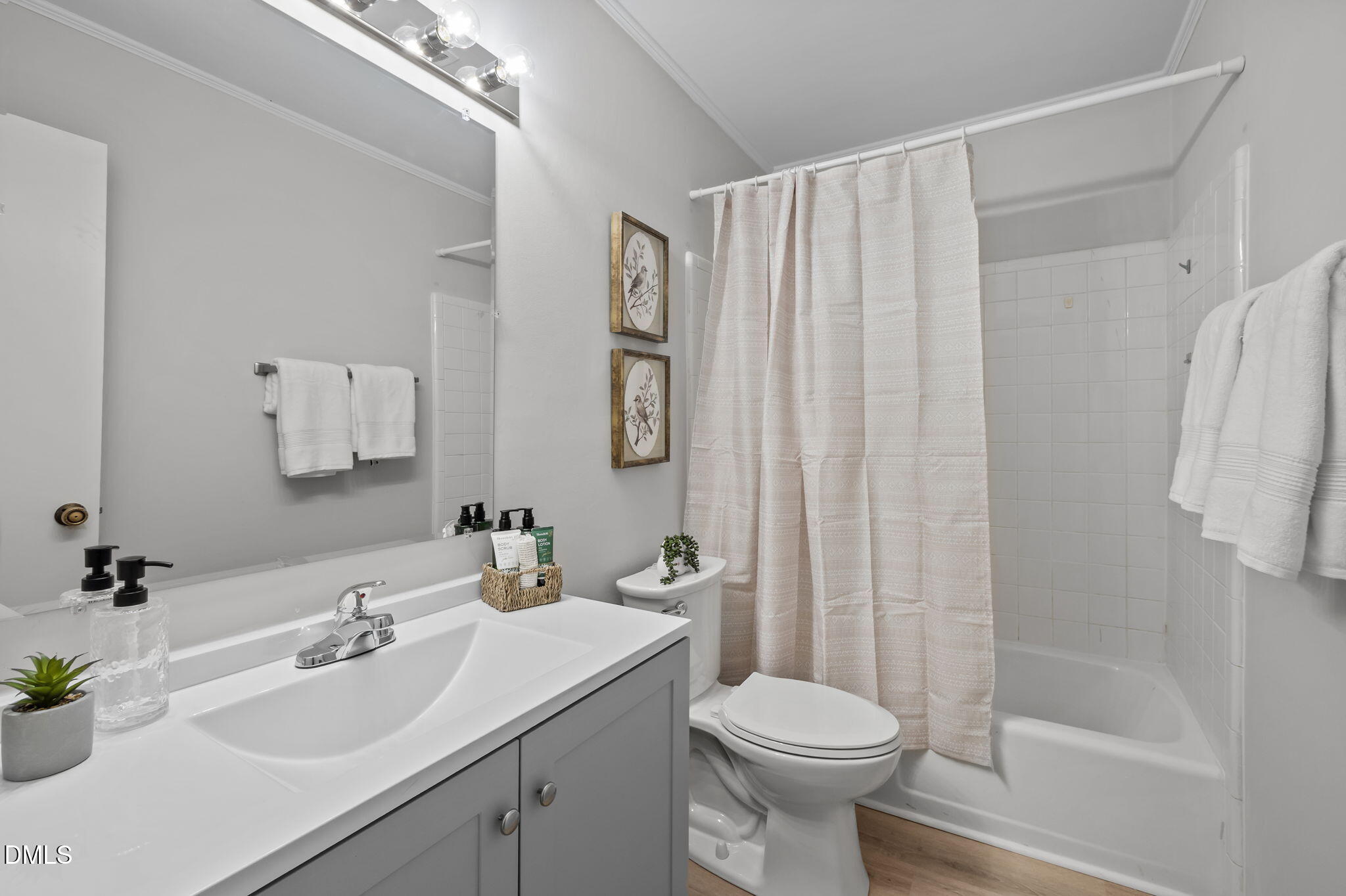 3080 Colony Road, Unit 3080C Durham, NC 27705 - Photo 27 of 57 a bathroom with a sink toilet and shower