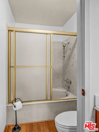 a view of a hallway with closet