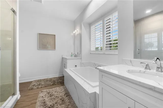 a bathroom with a sink and a bathtub
