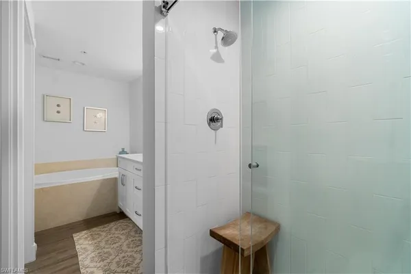 a bathroom with a sink a toilet and bathtub