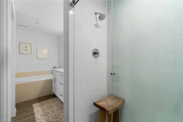 a bathroom with a sink a toilet and bathtub