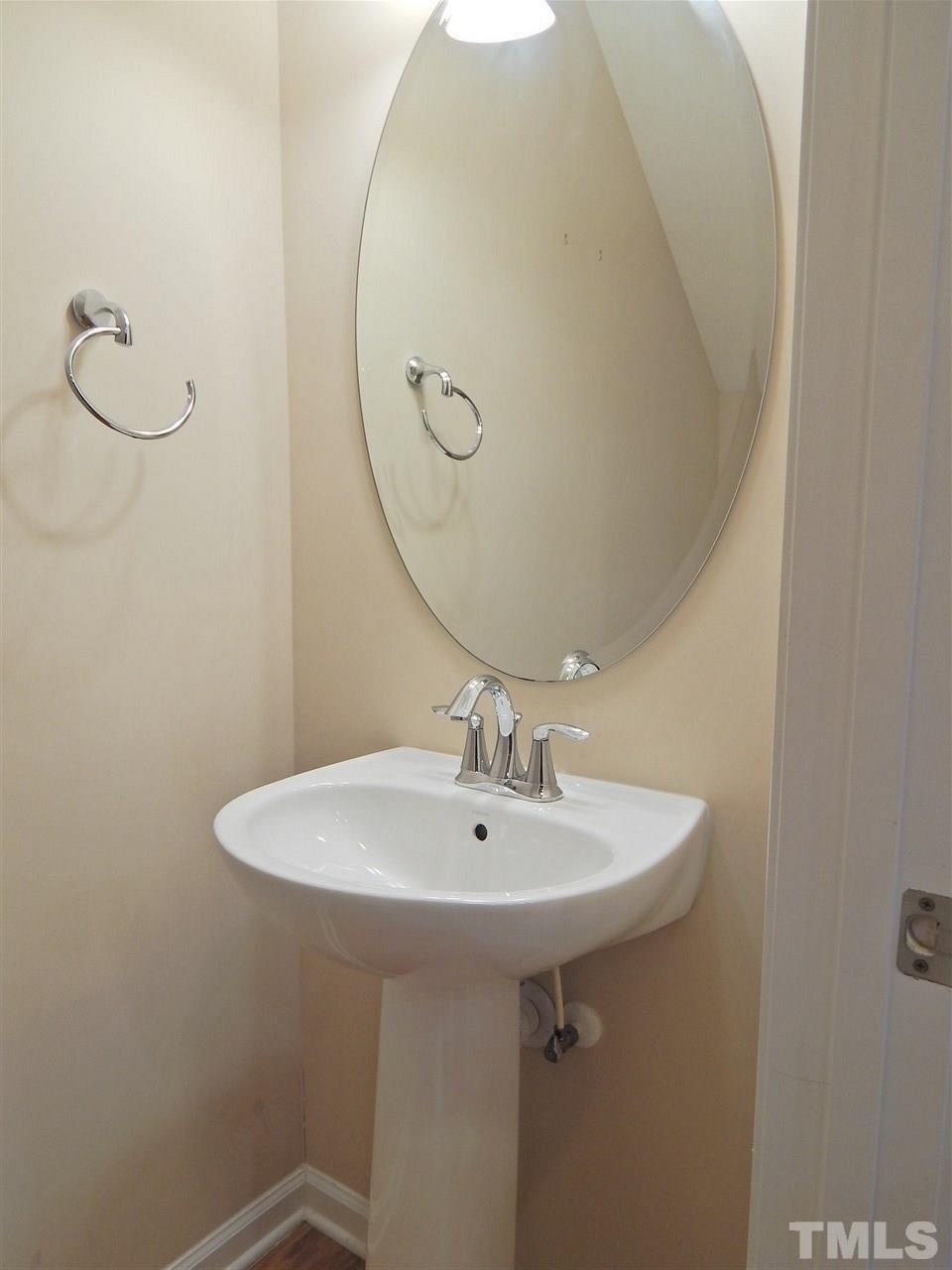 732 Wickham Ridge Road Apex, NC 27539 - Photo 6 of 29 1st floor half bath