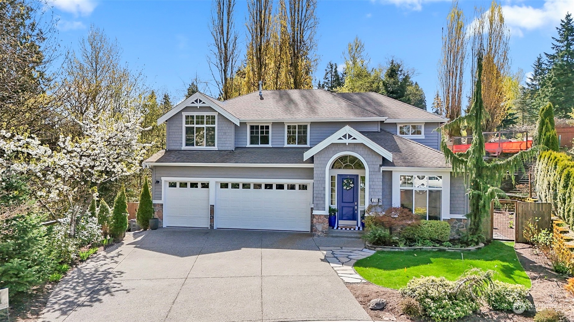 2732 233rd Place Southeast Bothell, WA 98021 - Photo 1 of 40 a front view of a house with a garden