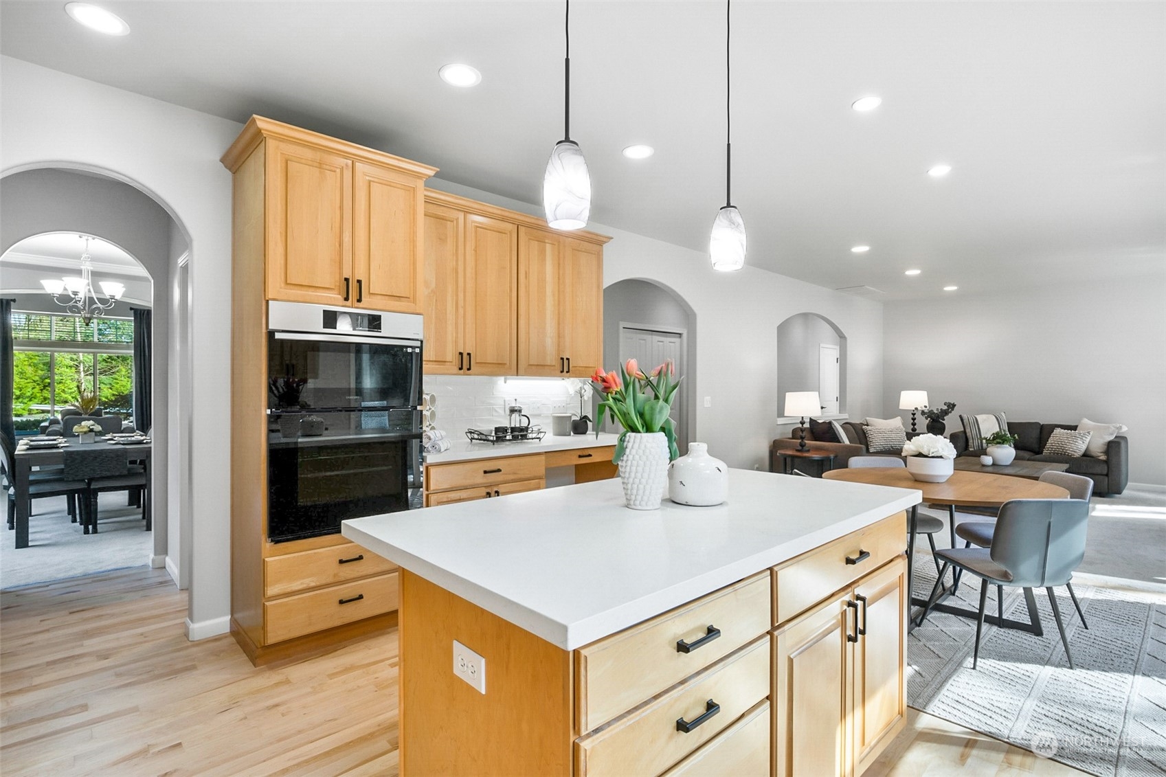 2732 233rd Place Southeast Bothell, WA 98021 - Photo 12 of 40 a kitchen with a stove a refrigerator a sink and chairs