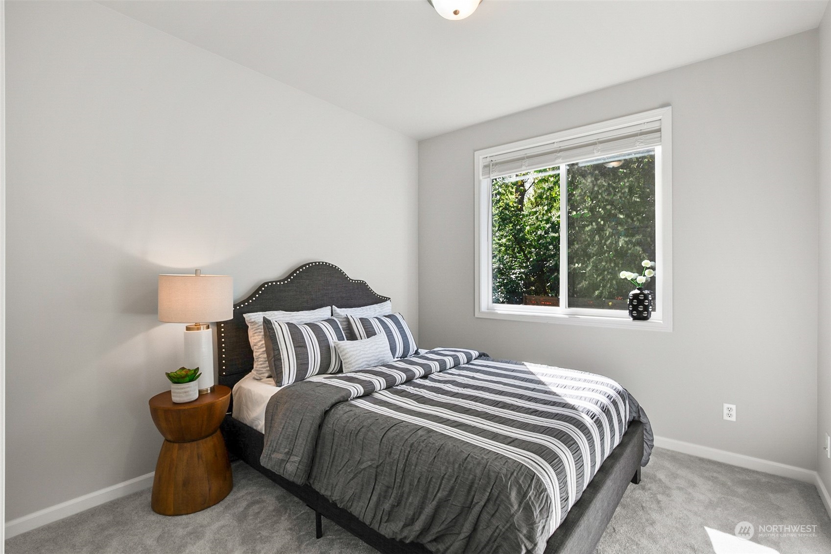 2732 233rd Place Southeast Bothell, WA 98021 - Photo 22 of 40 a bedroom with a bed and window