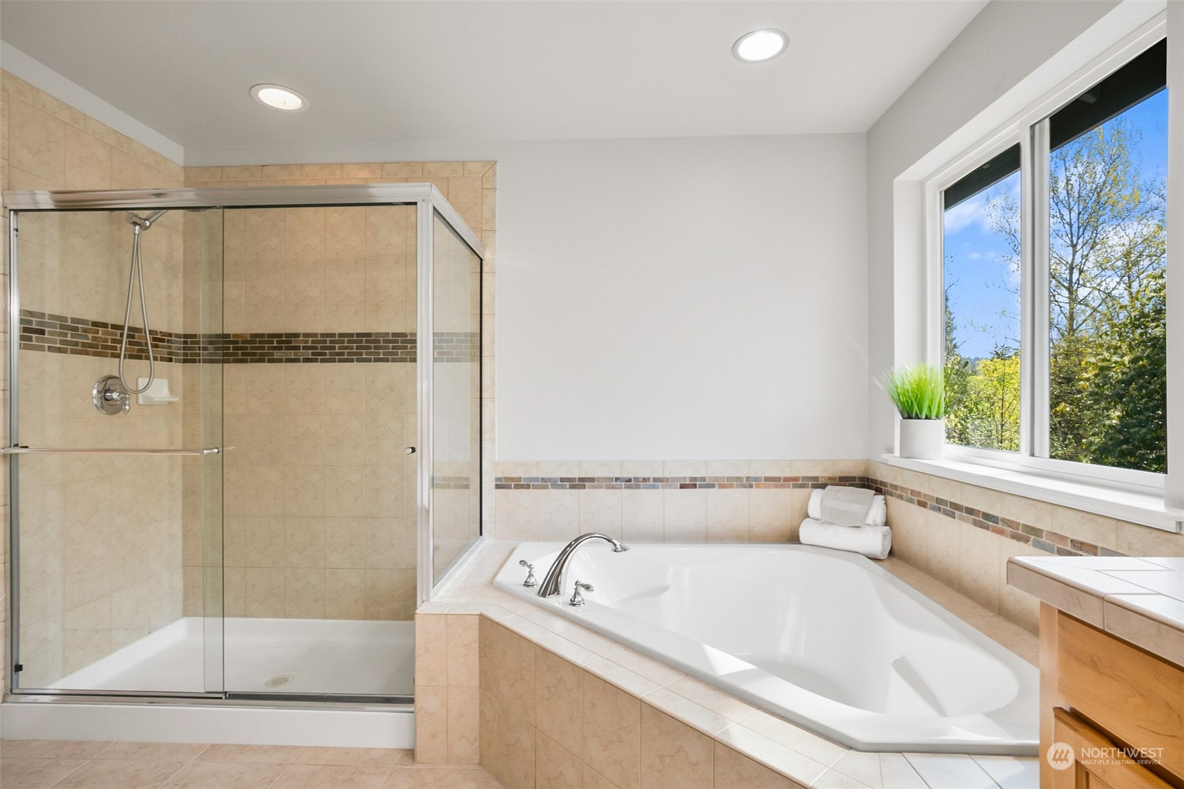 2732 233rd Place Southeast Bothell, WA 98021 - Photo 30 of 40 a bathroom with a tub and a shower