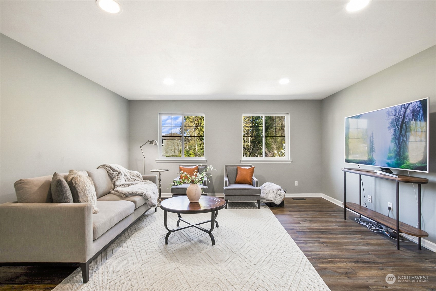 2732 233rd Place Southeast Bothell, WA 98021 - Photo 31 of 40 a living room with furniture and a flat screen tv