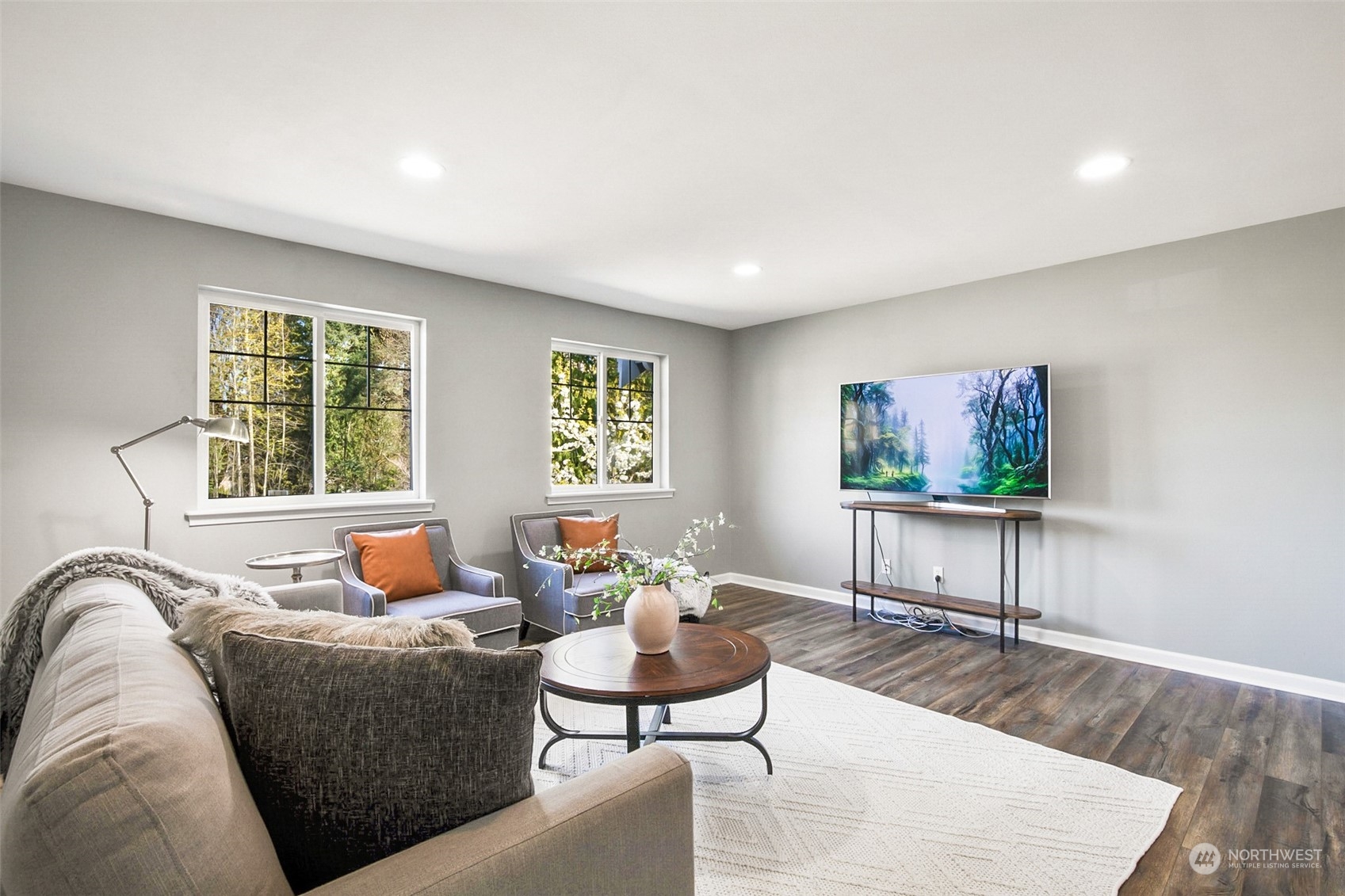 2732 233rd Place Southeast Bothell, WA 98021 - Photo 32 of 40 a living room with furniture and a flat screen tv
