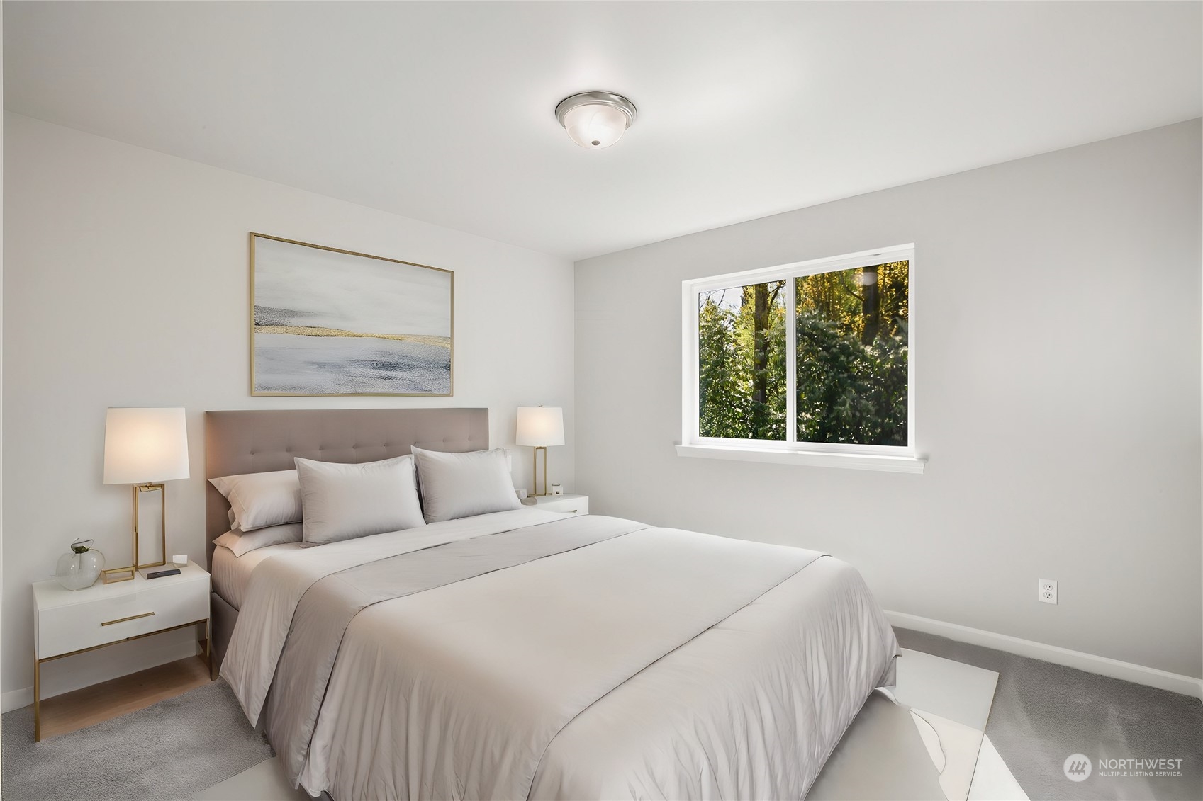 2732 233rd Place Southeast Bothell, WA 98021 - Photo 36 of 40 a bedroom with a bed and a painting on the wall