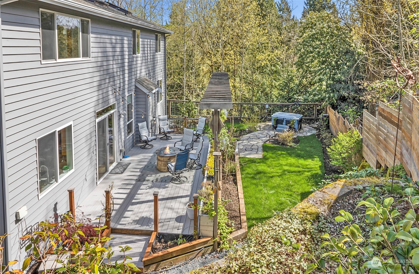 2732 233rd Place Southeast Bothell, WA 98021 - Photo 37 of 40 a view of balcony with two chairs and a table