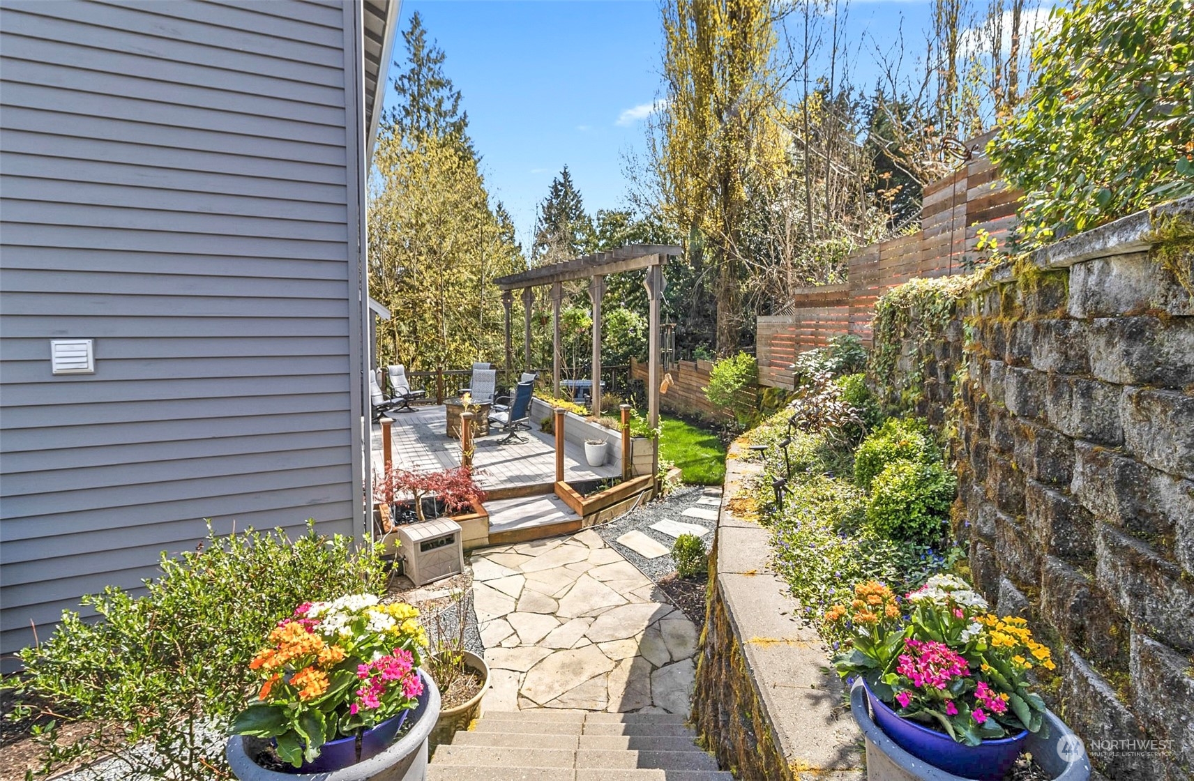 2732 233rd Place Southeast Bothell, WA 98021 - Photo 38 of 40 a view of a chairs and table in a backyard