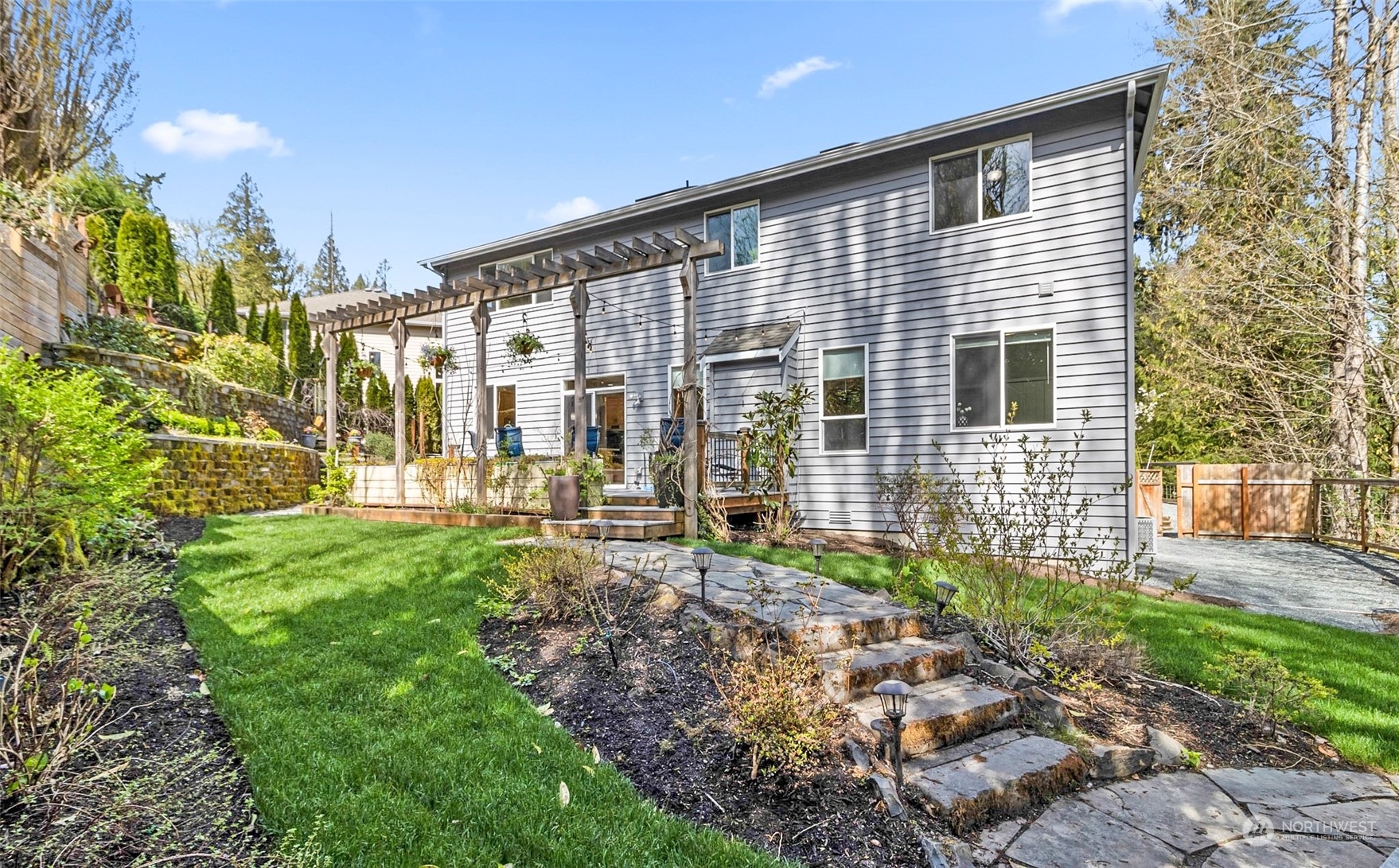 2732 233rd Place Southeast Bothell, WA 98021 - Photo 39 of 40 a view of a house with a backyard