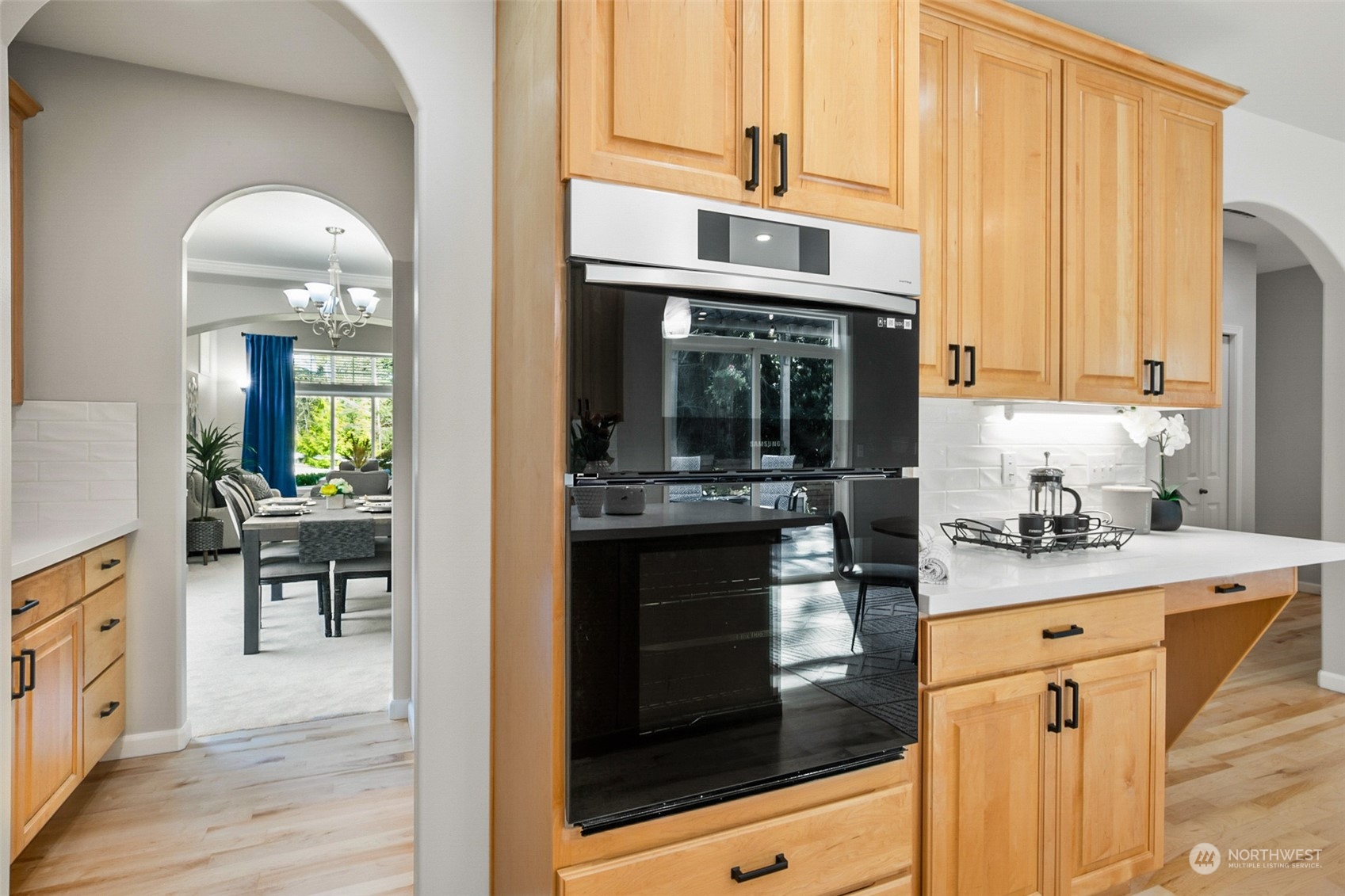2732 233rd Place Southeast Bothell, WA 98021 - Photo 6 of 40 a kitchen with stainless steel appliances granite countertop a stove and a sink