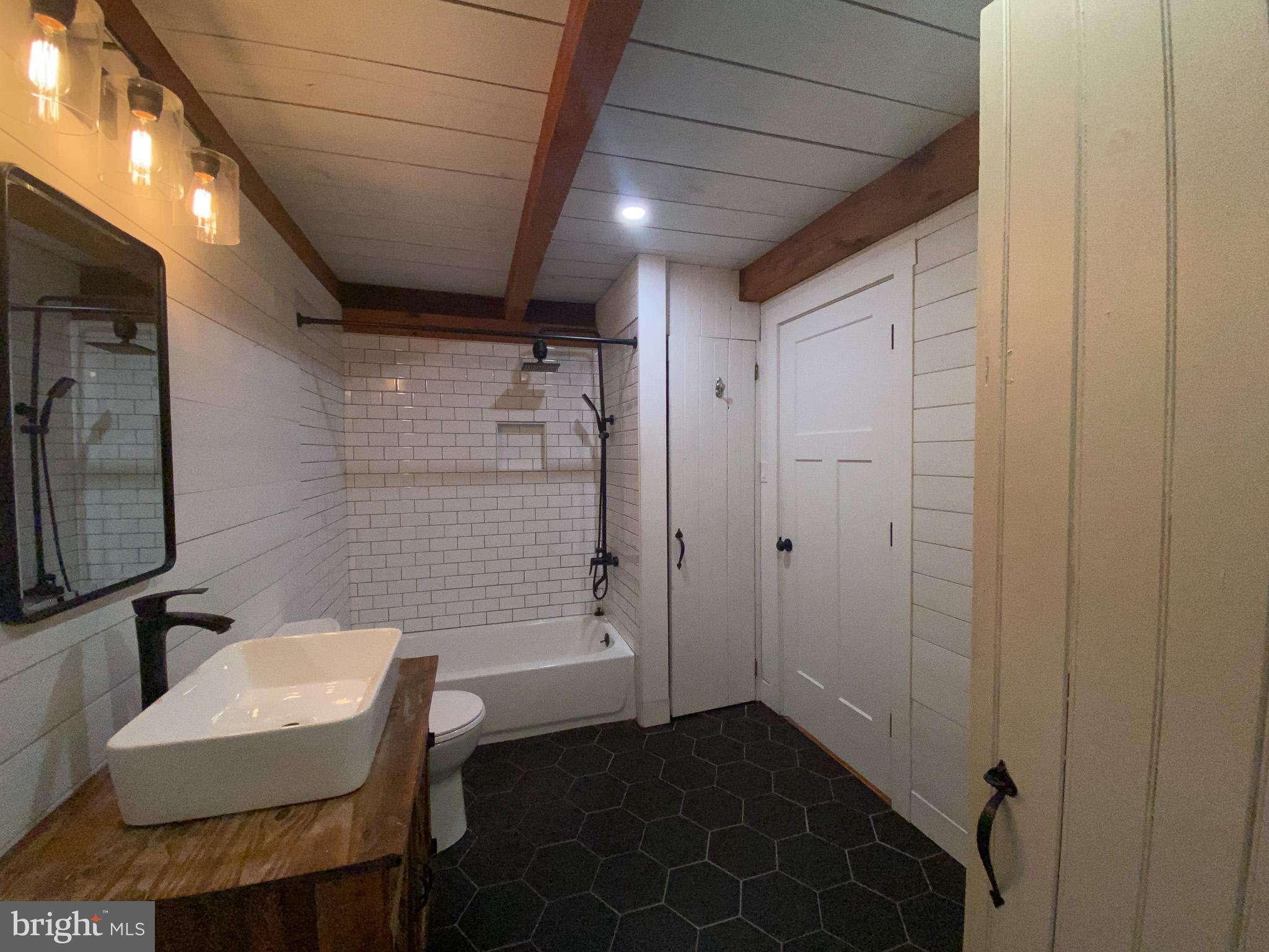 15 Davidson Road West Chester, PA 19382 - Photo 12 of 36 Chic bathroom with rustic charm and elegance.