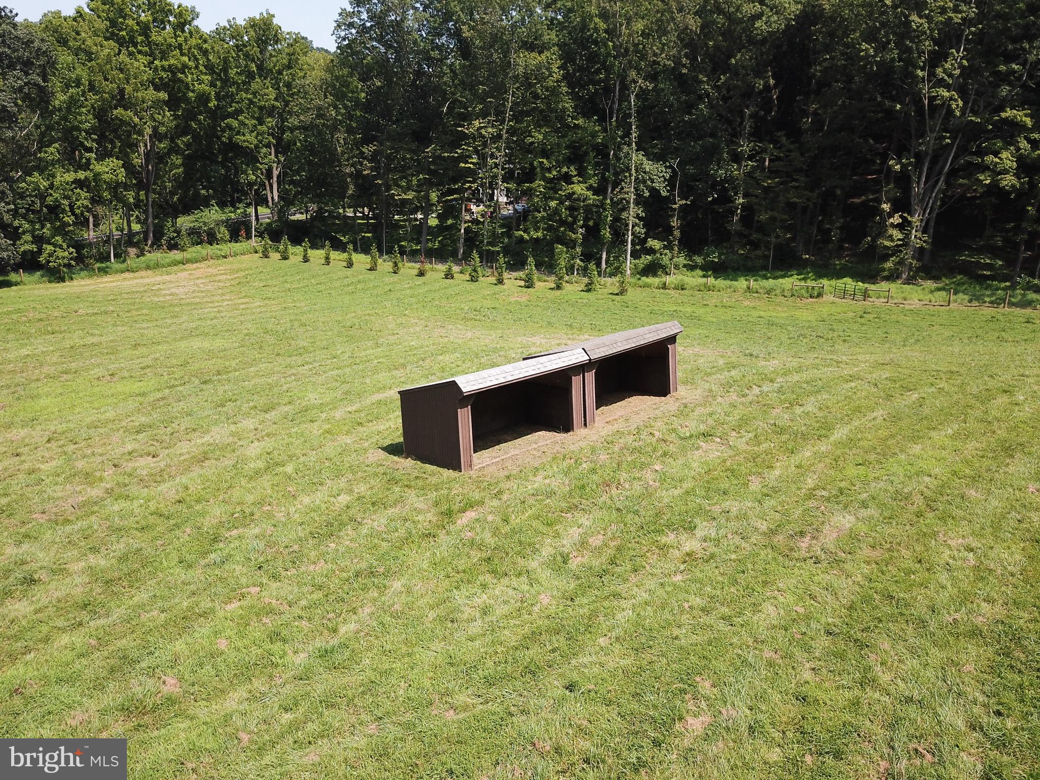 15 Davidson Road West Chester, PA 19382 - Photo 25 of 36 Serene landscape with minimalist seating.