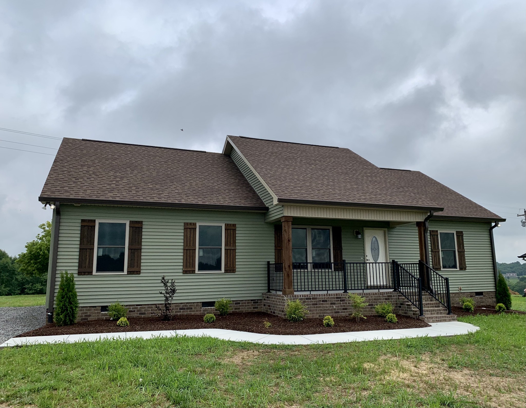 589 Womack Road Bethpage, TN 37022 - Photo 1 of 20 a front view of a house with a yard