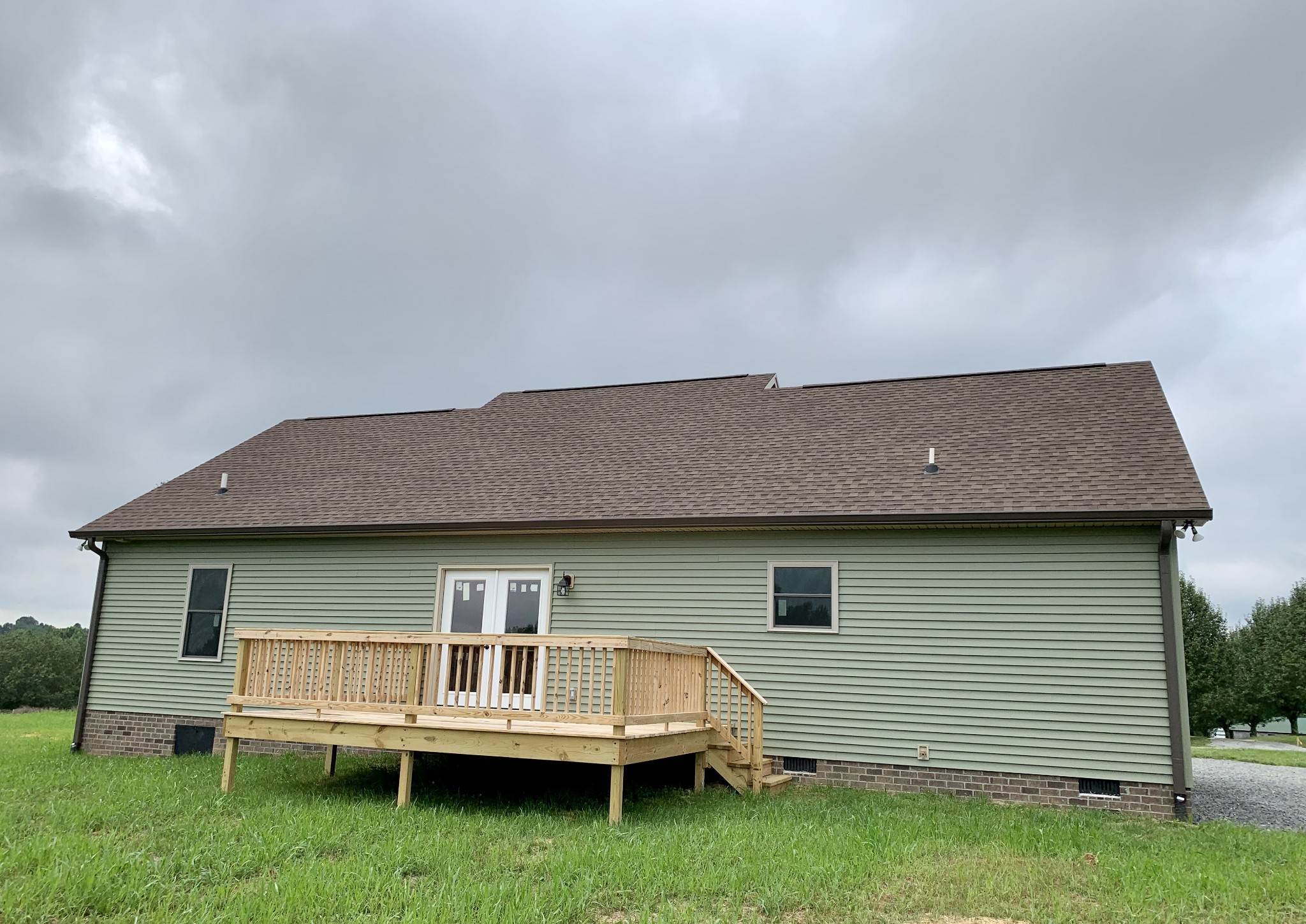 589 Womack Road Bethpage, TN 37022 - Photo 19 of 20 a front view of a house with a yard