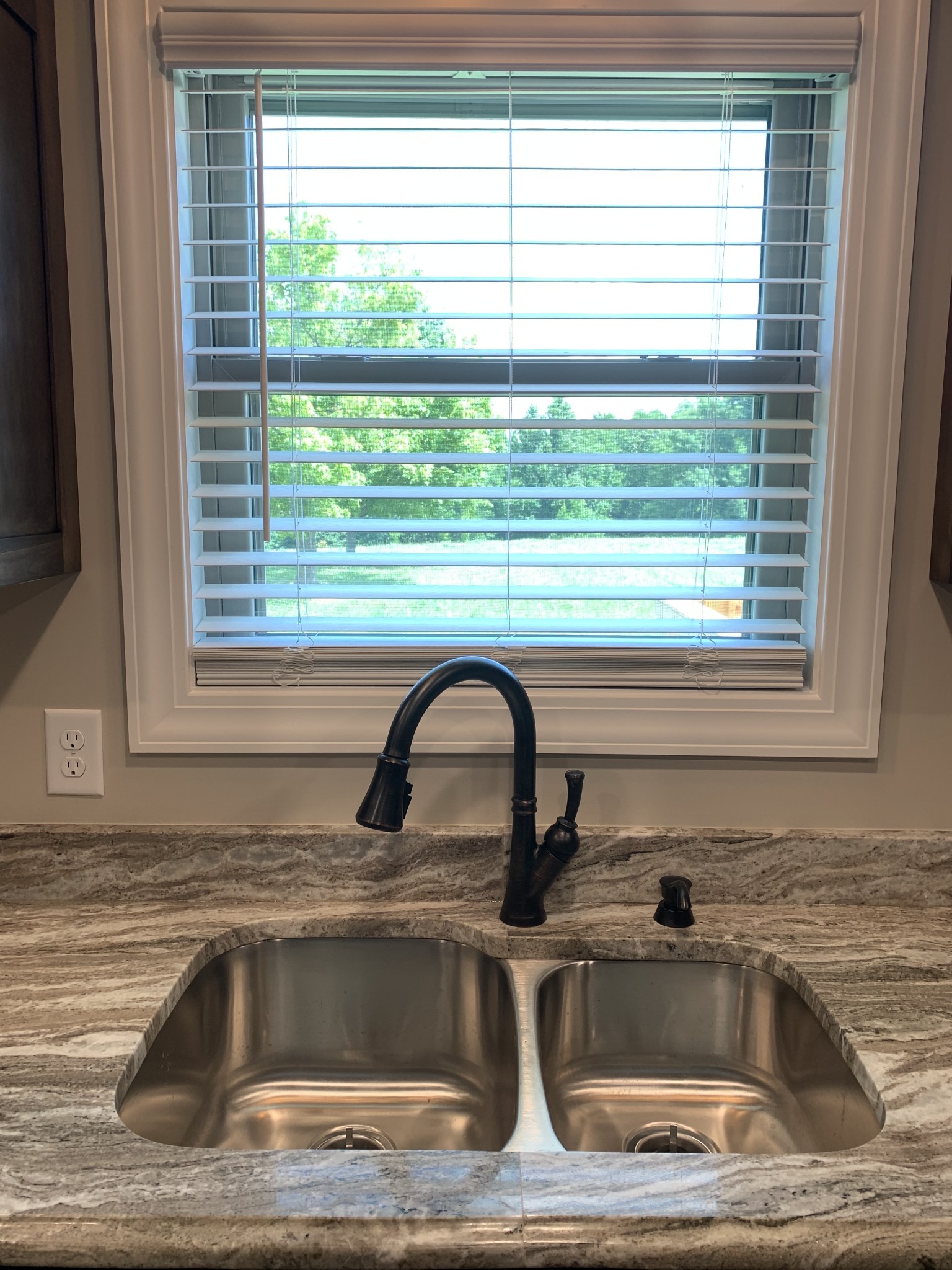 589 Womack Road Bethpage, TN 37022 - Photo 5 of 20 a view of kitchen sink and dishwasher next to a window