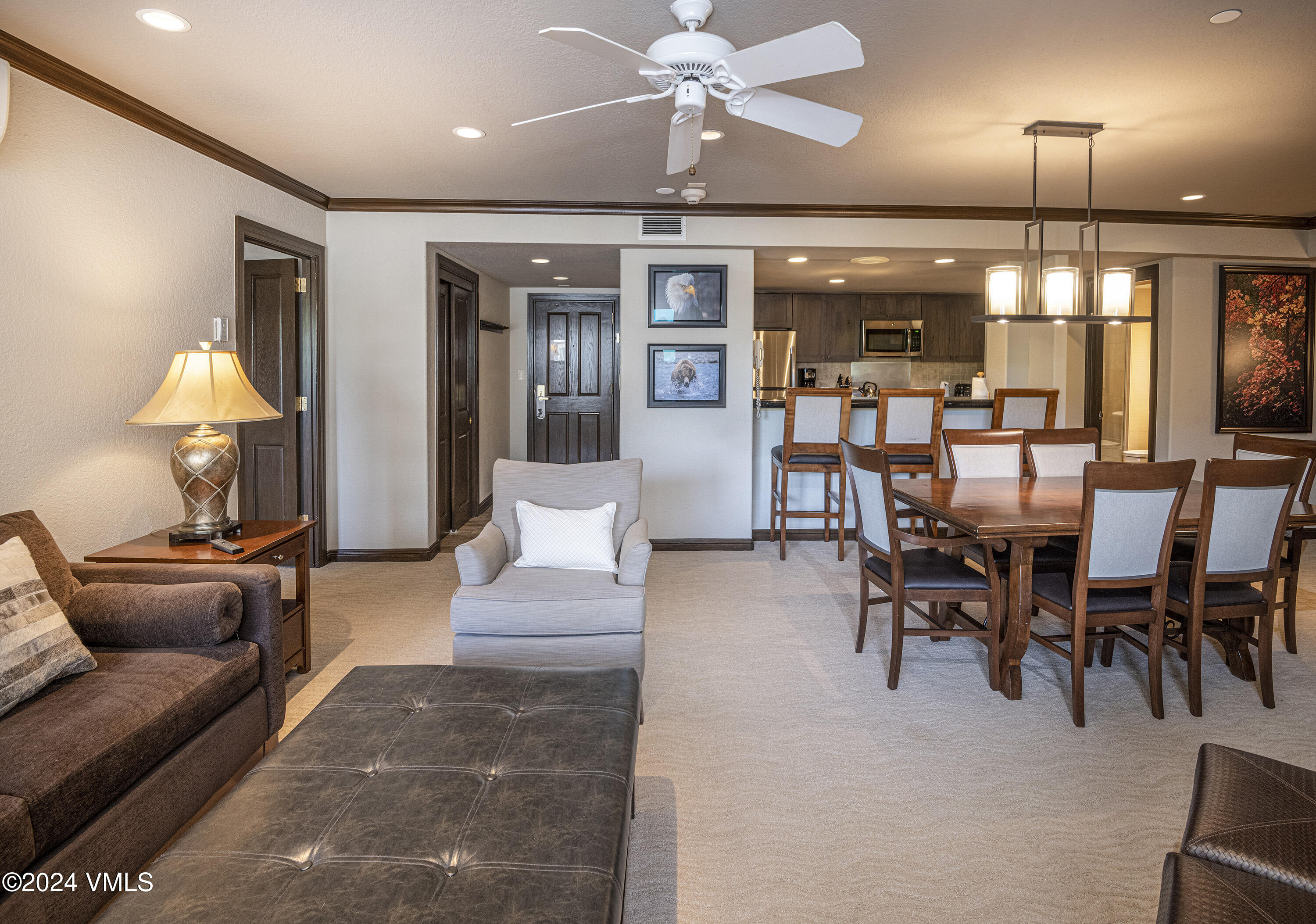 210 Offerson Road, Unit 212WEEK 51 Beaver Creek, CO 81620 - Photo 3 of 24 a living room with furniture and a chandelier