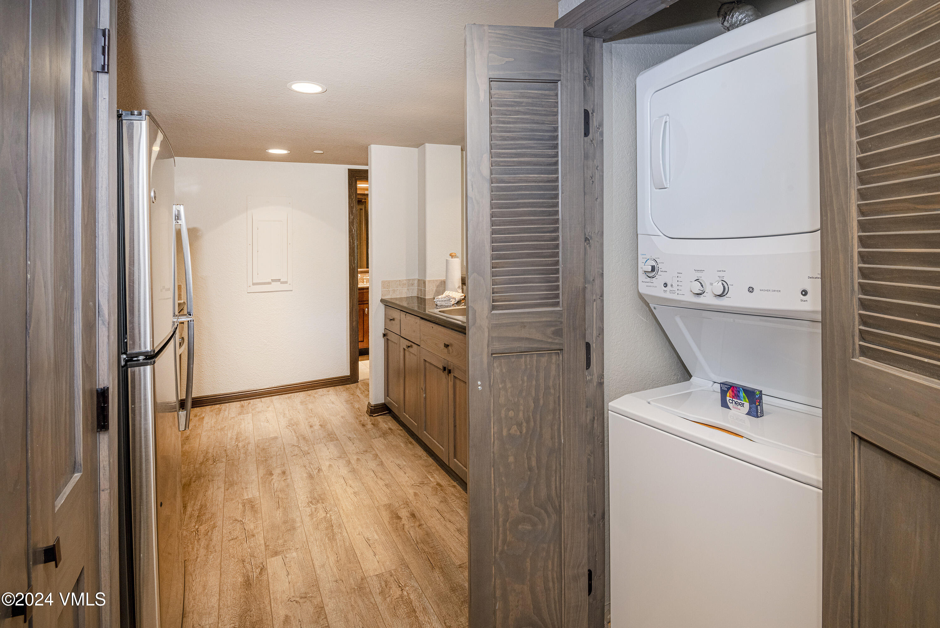 210 Offerson Road, Unit 212WEEK 51 Beaver Creek, CO 81620 - Photo 8 of 24 a view of hallway with washer and dryer