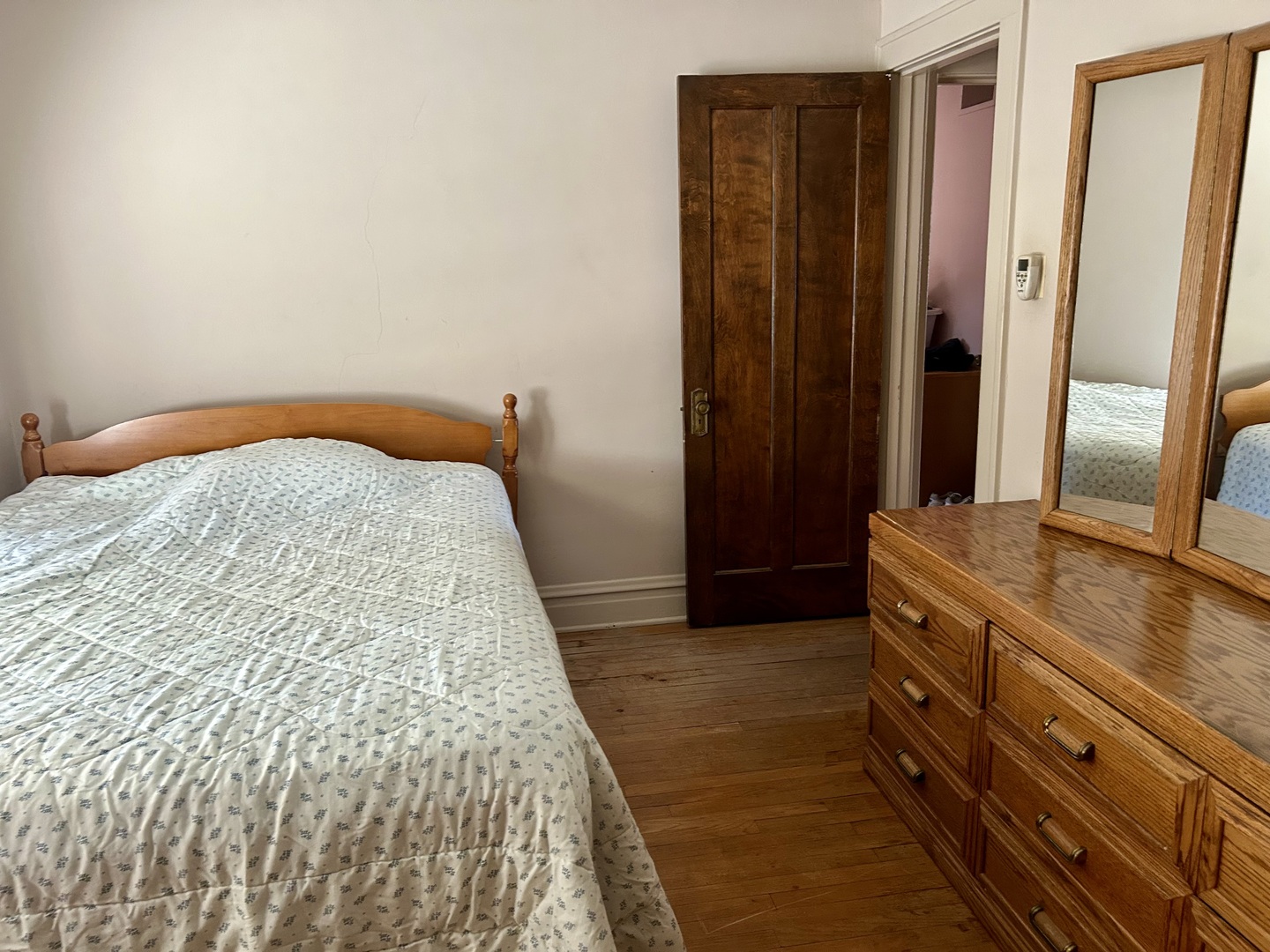 8542 School Street Morton Grove, IL 60053 - Photo 11 of 28 a bathroom with a granite countertop sink and a mirror