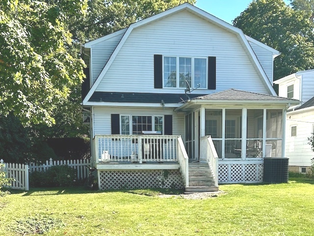 8542 School Street Morton Grove, IL 60053 - Photo 2 of 28 a front view of a house with a garden