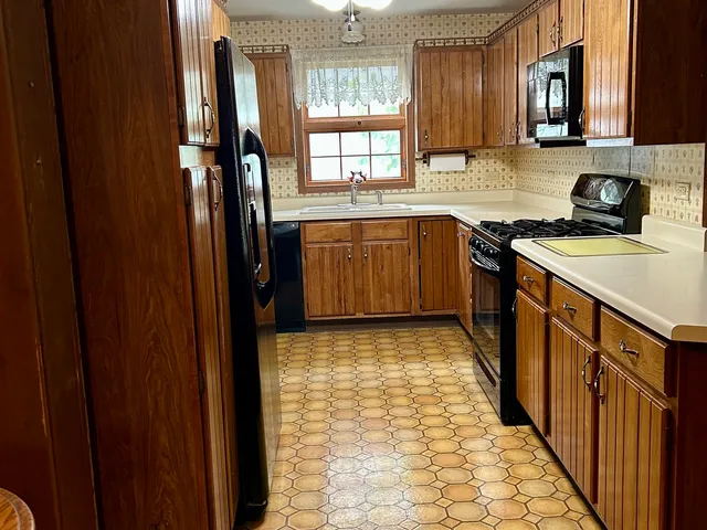 a view of a kitchen with a sink