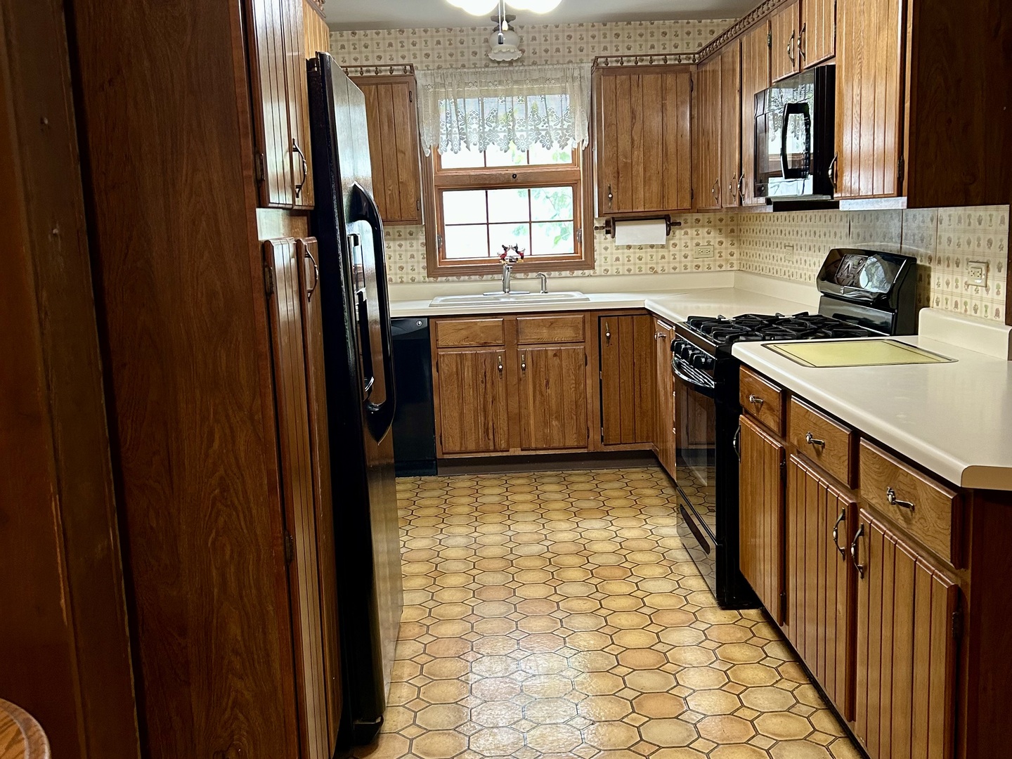 8542 School Street Morton Grove, IL 60053 - Photo 7 of 28 a view of a kitchen with a sink