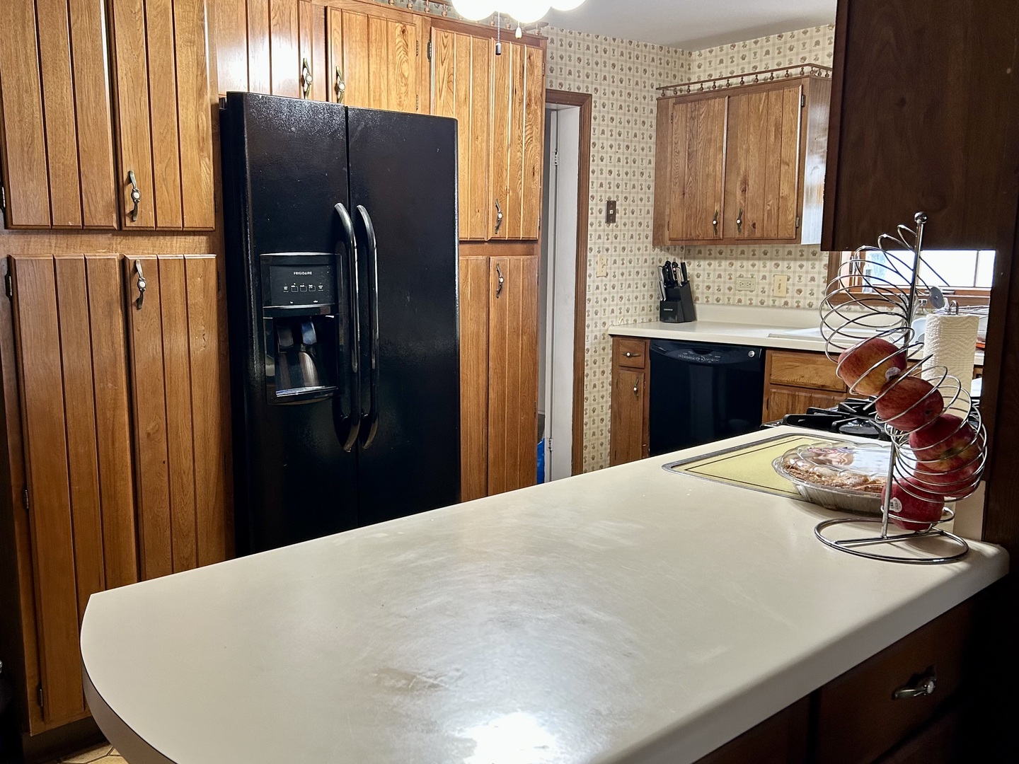 8542 School Street Morton Grove, IL 60053 - Photo 9 of 28 a kitchen with stainless steel appliances a refrigerator and a stove