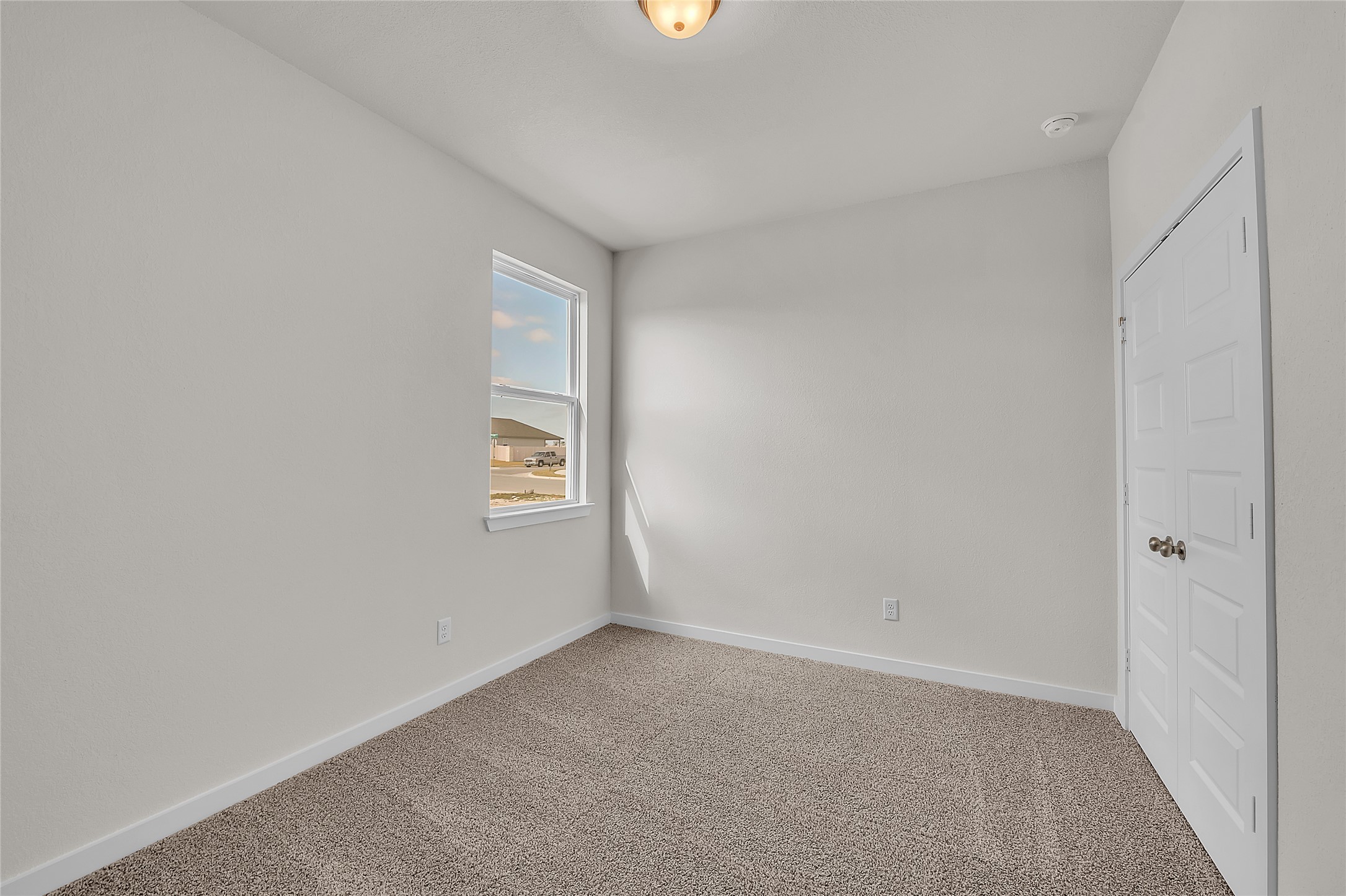 308 Boatright Boulevard Jarrell, TX 76537 - Photo 6 of 31 Unfurnished bedroom featuring carpet flooring and baseboards
