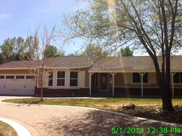 11085 Raintree Court Reno, NV 89511 - Photo 1 of 1 front view of a house with a yard