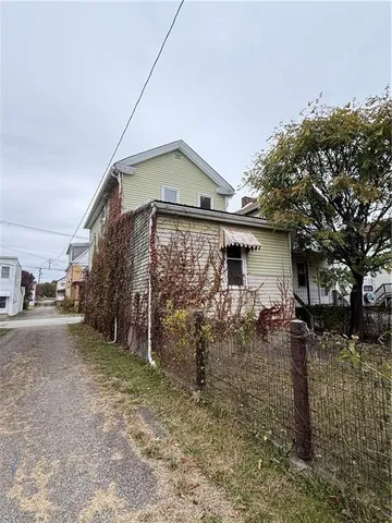 a front view of house with a yard