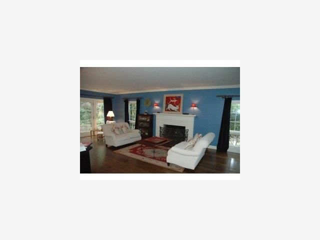 96 Laburnum Road Atherton, CA 94027 - Photo 3 of 9 a living room with furniture and a fireplace