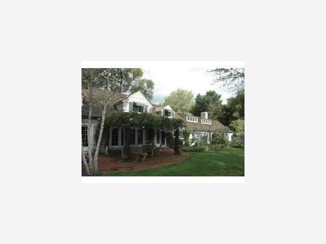 96 Laburnum Road Atherton, CA 94027 - Photo 5 of 9 a picture of a bench in front of a building