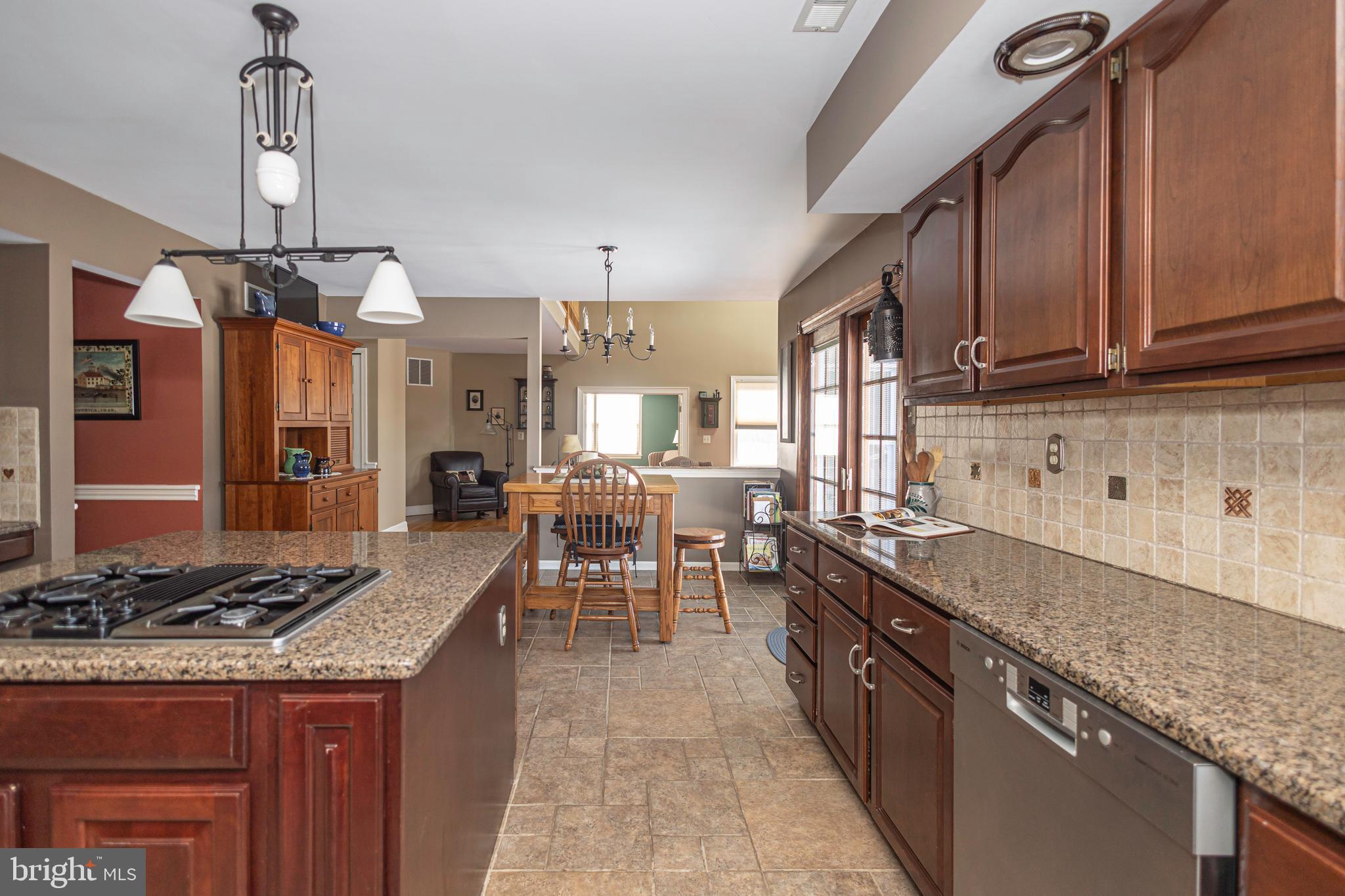 895 Slate Hill Road Yardley, PA 19067 - Photo 30 of 67 a kitchen with granite countertop lots of counter top space