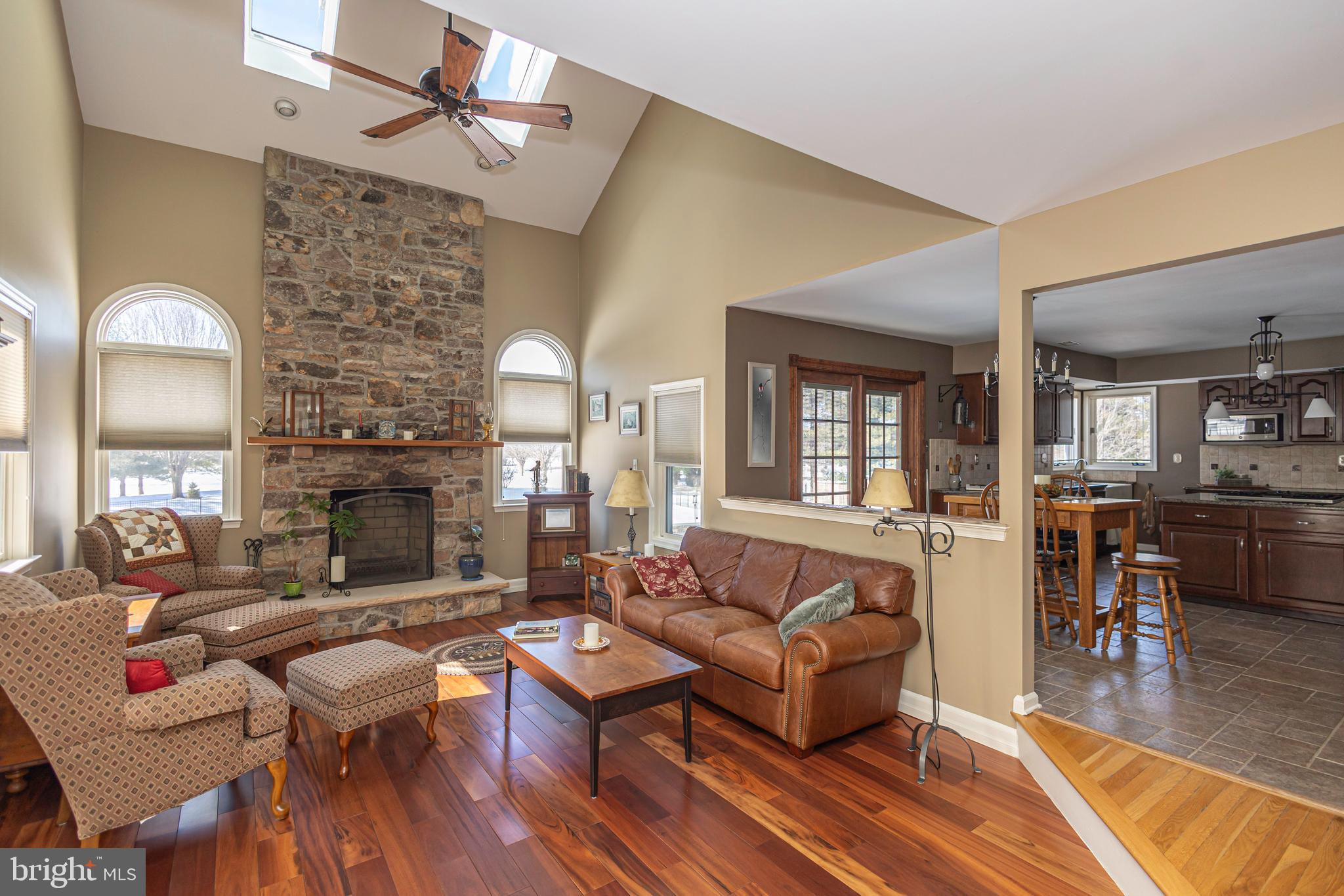 895 Slate Hill Road Yardley, PA 19067 - Photo 33 of 67 a living room with fireplace furniture and wooden floor