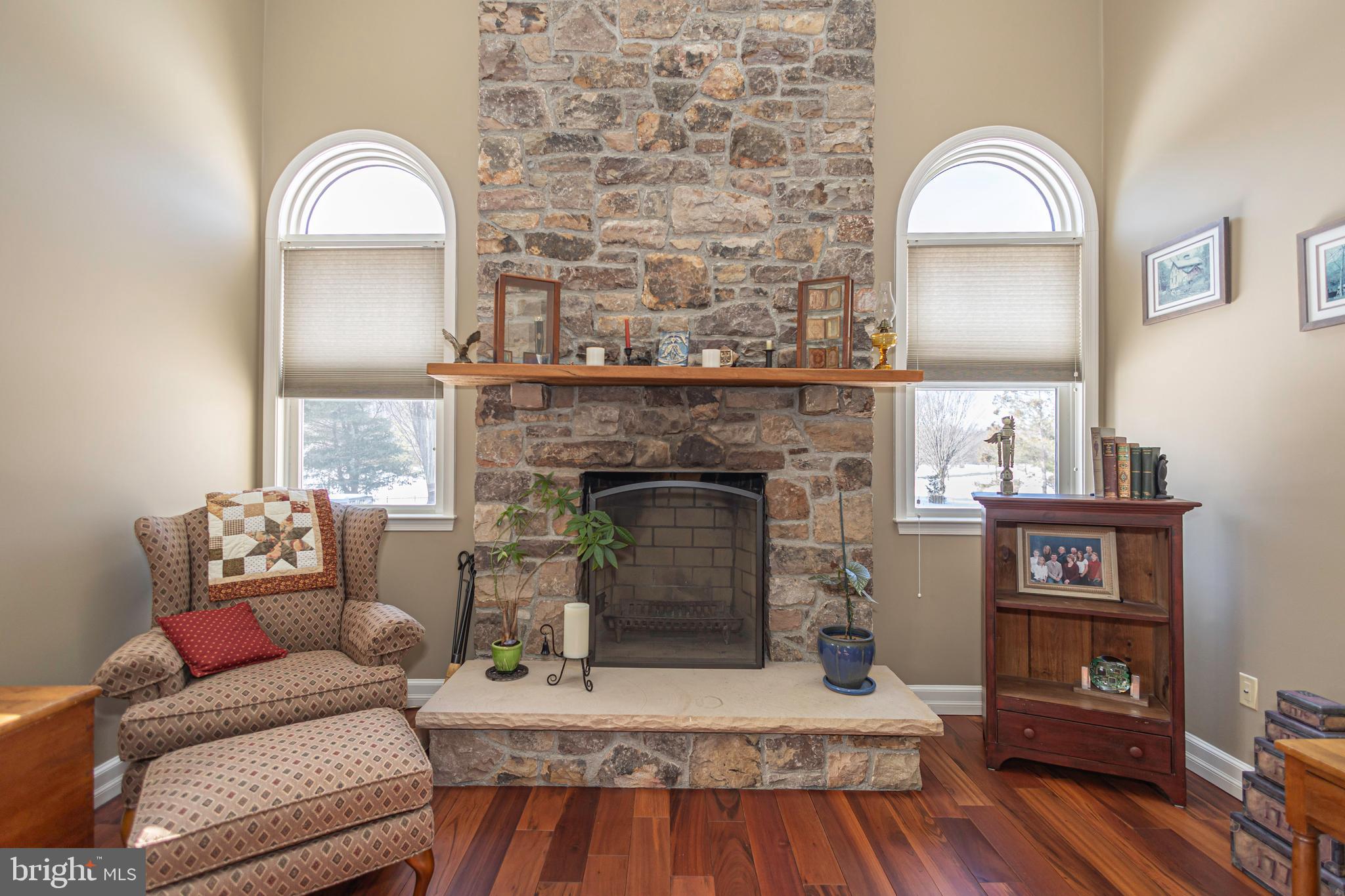 895 Slate Hill Road Yardley, PA 19067 - Photo 36 of 67 a living room with furniture and a fireplace