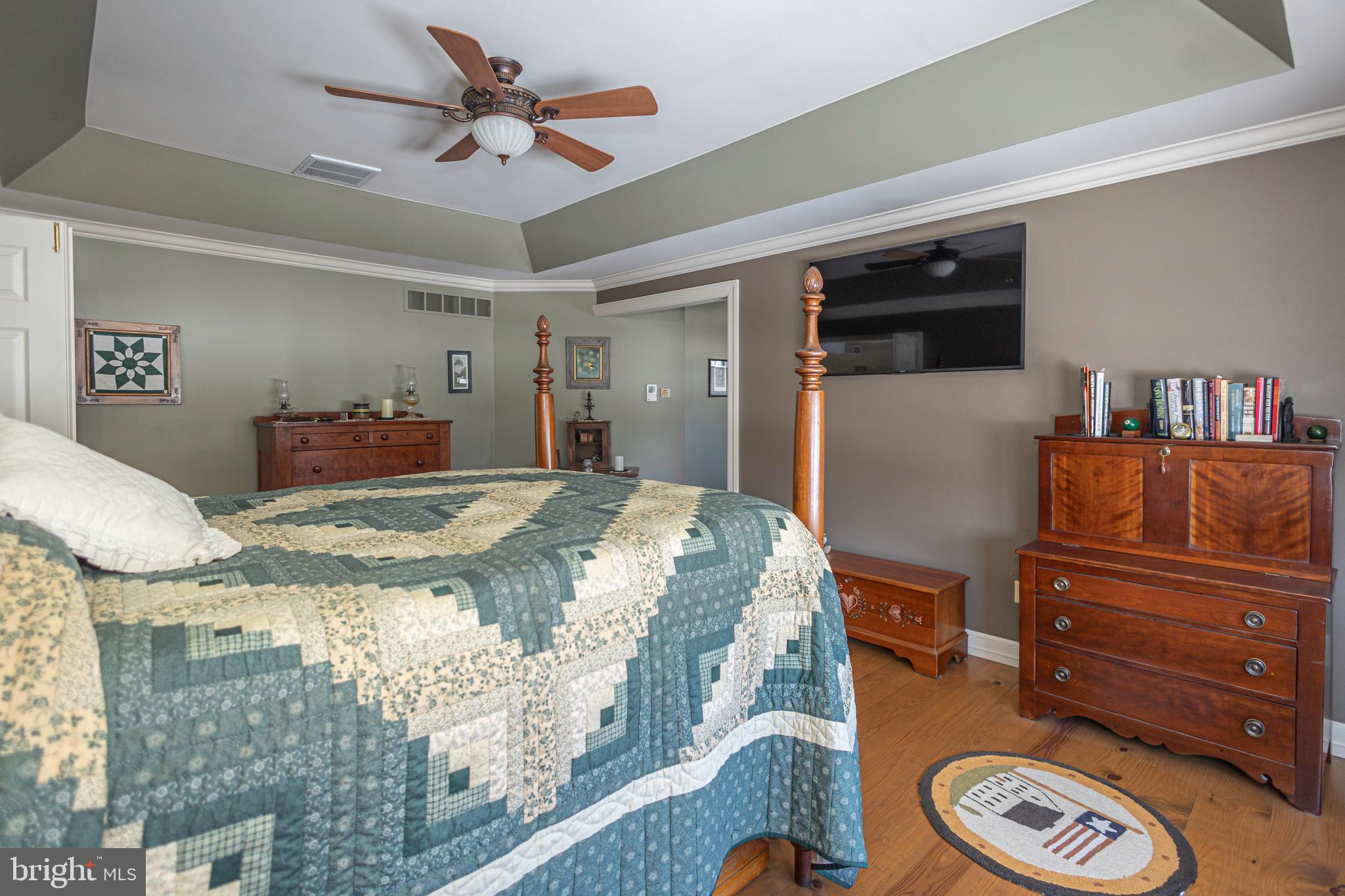 895 Slate Hill Road Yardley, PA 19067 - Photo 47 of 67 a bedroom with a bed and a dresser