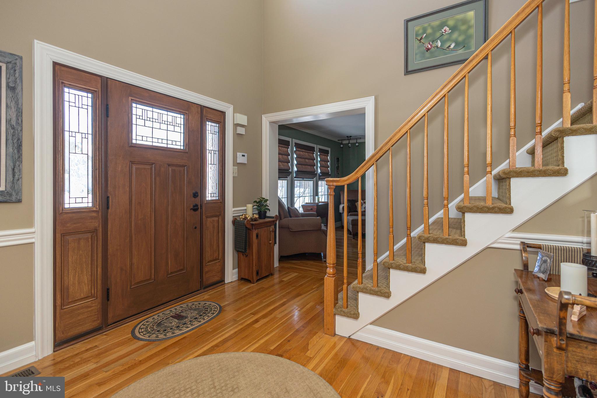 895 Slate Hill Road Yardley, PA 19067 - Photo 5 of 67 a view of entryway and hall with wooden floor