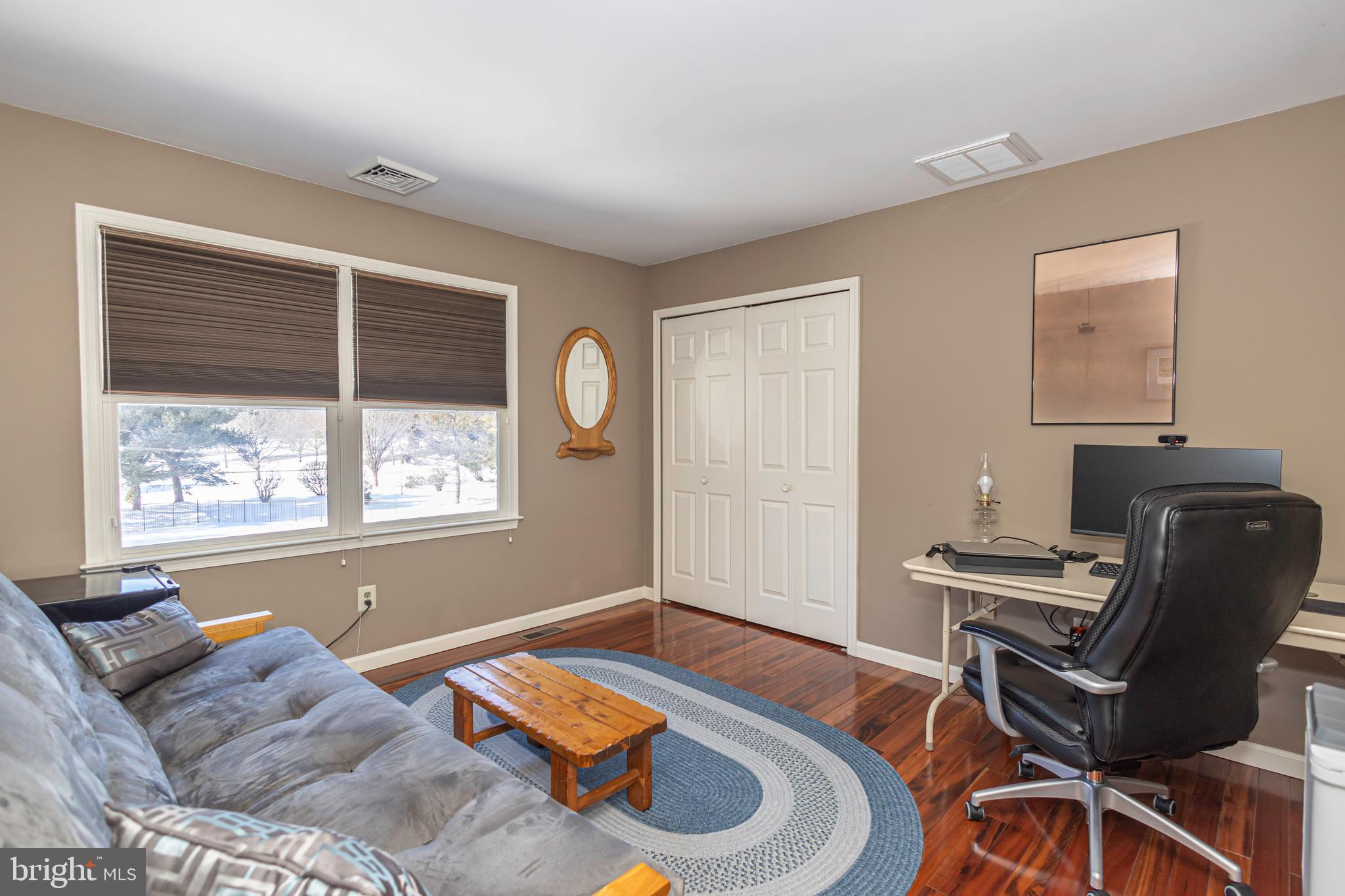 895 Slate Hill Road Yardley, PA 19067 - Photo 58 of 67 a living room with furniture and a window