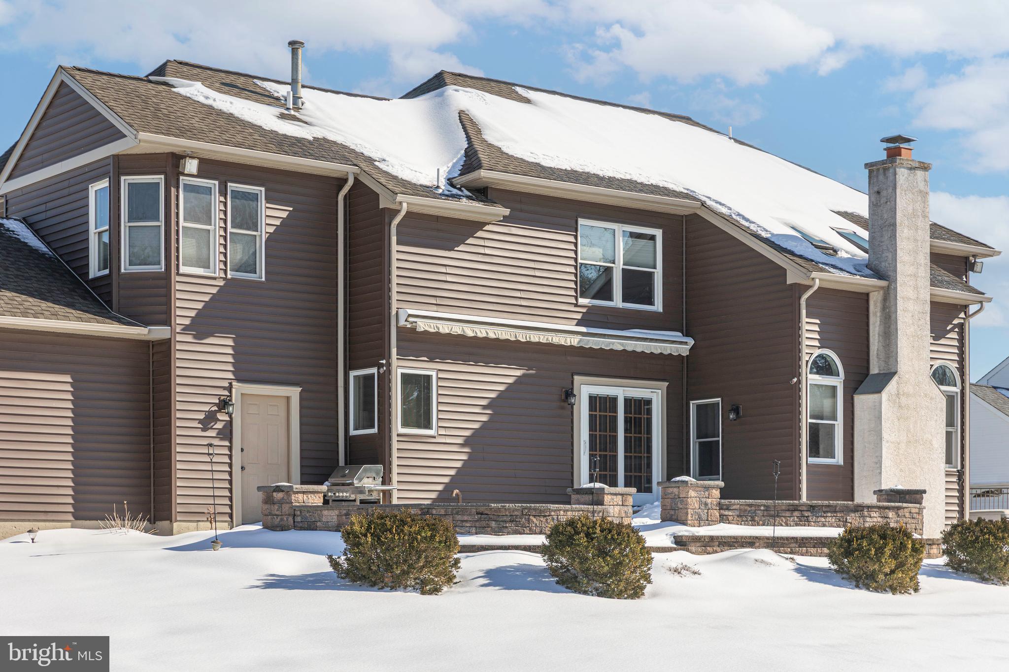 895 Slate Hill Road Yardley, PA 19067 - Photo 61 of 67 a front view of a house with a yard