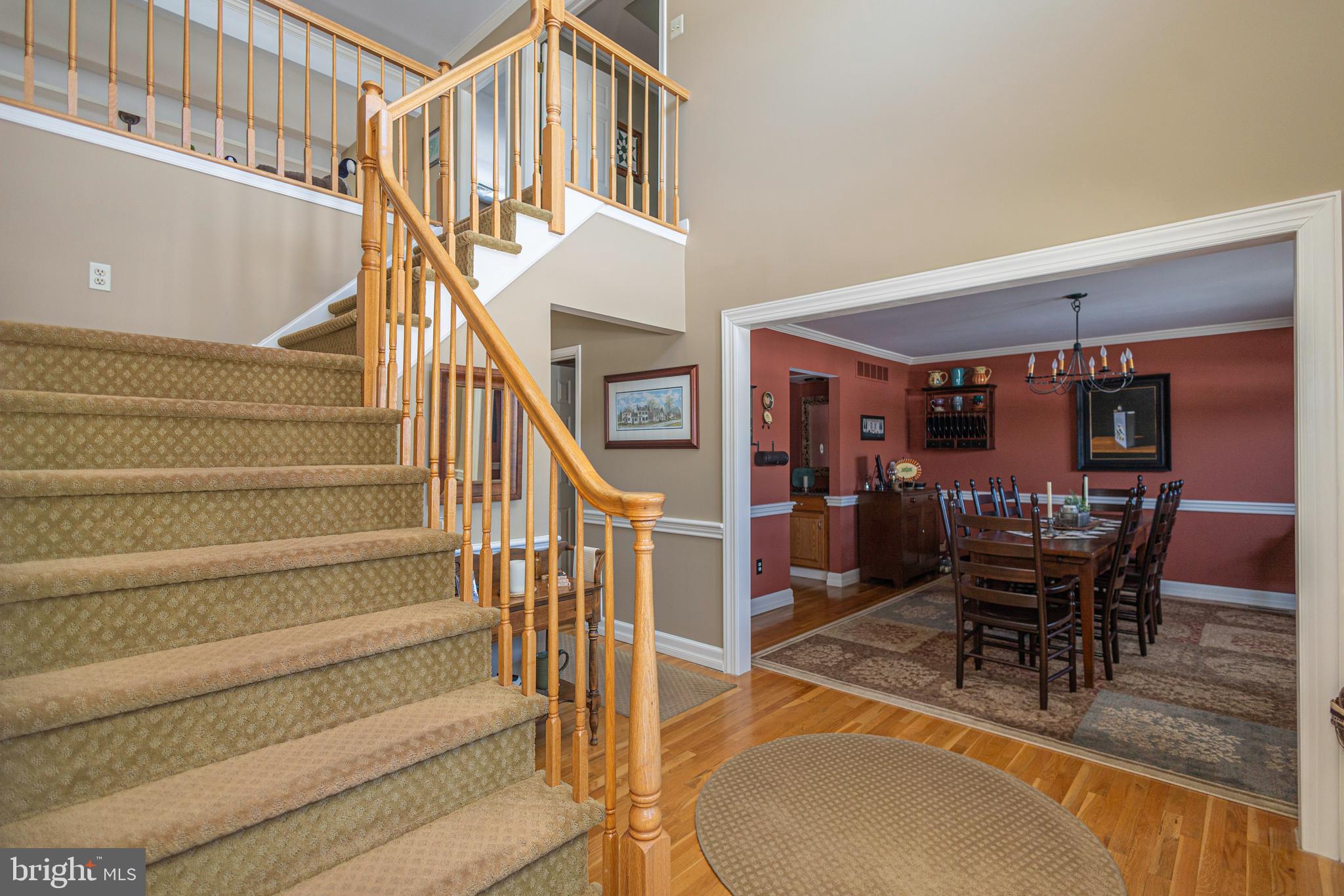 895 Slate Hill Road Yardley, PA 19067 - Photo 9 of 67 a view of a livingroom with furniture and a dining table