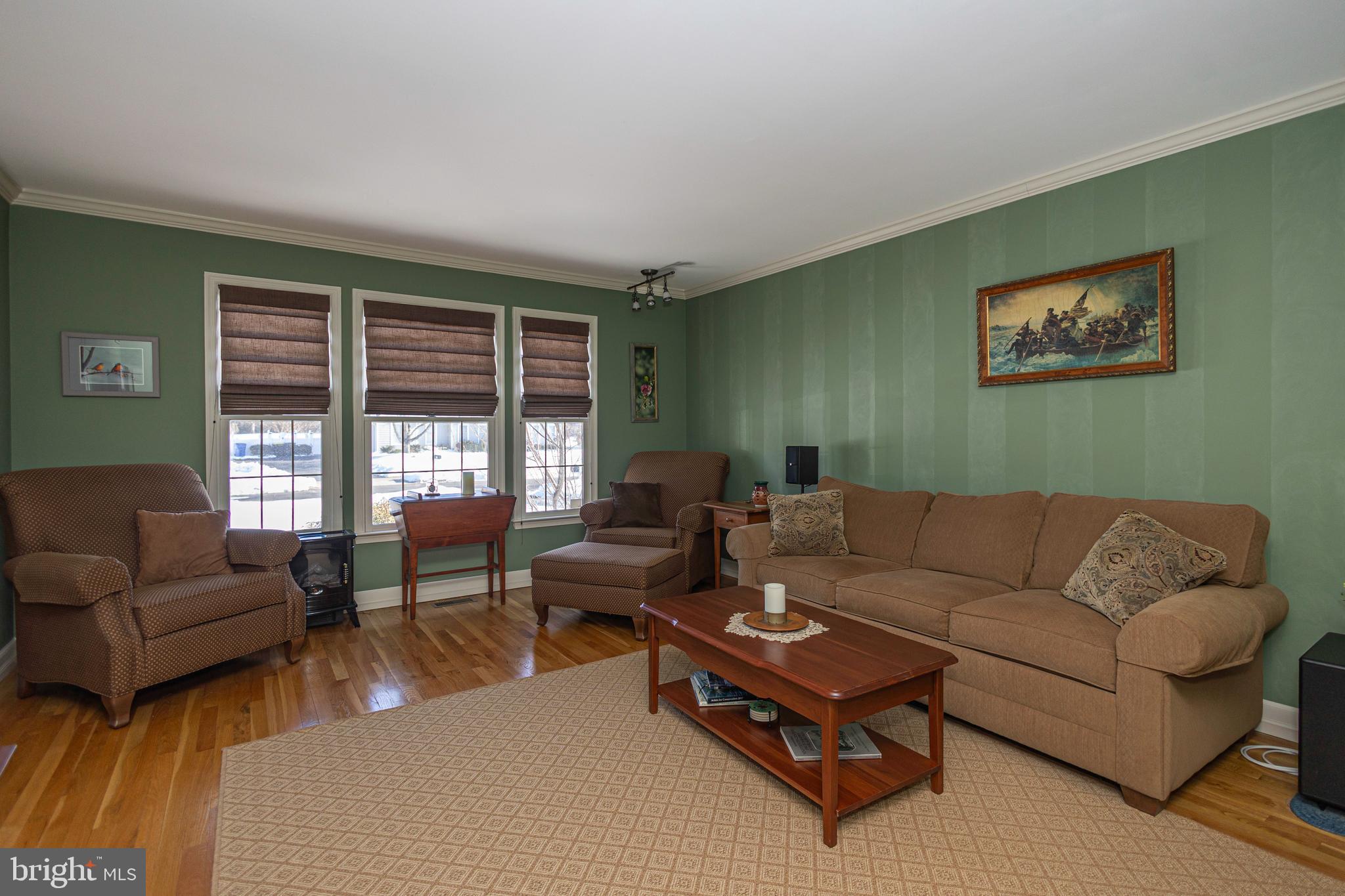 895 Slate Hill Road Yardley, PA 19067 - Photo 10 of 67 a living room with furniture and a large window
