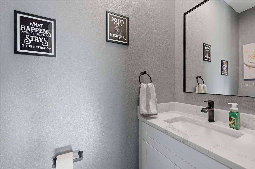 20 Brig Circle East Placida, FL 33946 - Photo 16 of 44 a bathroom with a sink and a mirror