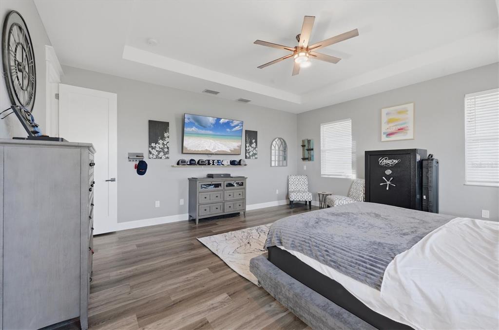 20 Brig Circle East Placida, FL 33946 - Photo 19 of 44 a spacious bedroom with a bed and a flat screen tv