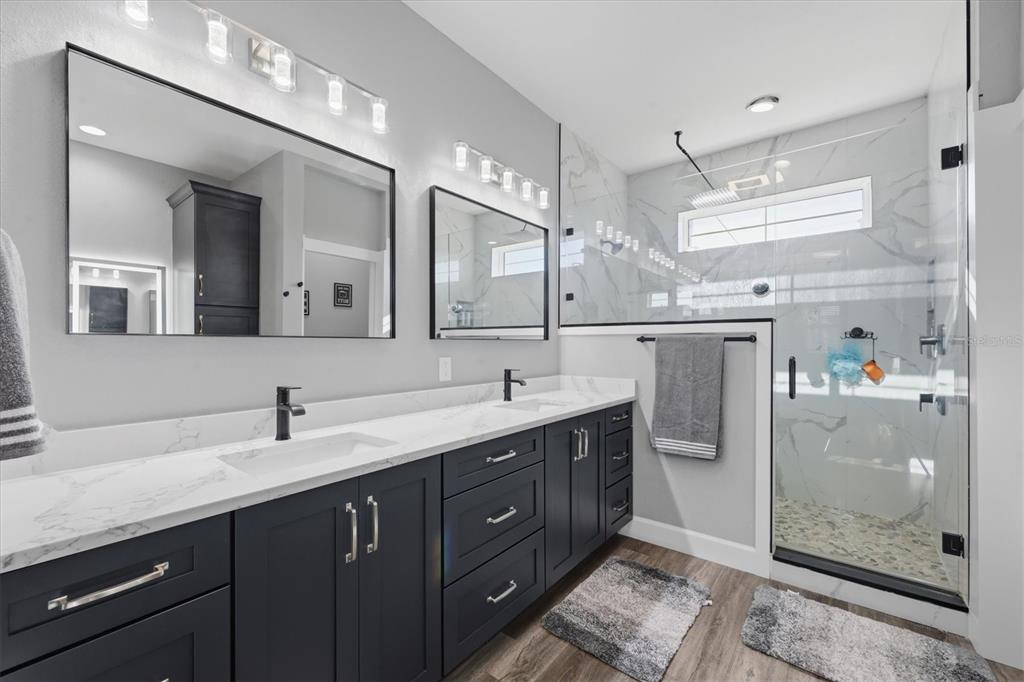 20 Brig Circle East Placida, FL 33946 - Photo 21 of 44 a spacious bathroom with a double vanity sink mirror and double