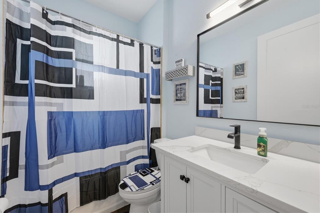 20 Brig Circle East Placida, FL 33946 - Photo 25 of 44 a bathroom with a sink a toilet and shower