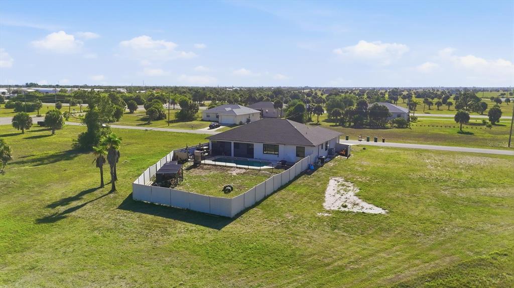 20 Brig Circle East Placida, FL 33946 - Photo 36 of 44 an aerial view of a house with a swimming pool yard and outdoor seating
