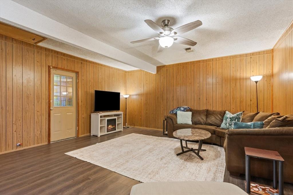 106 South Barbara Street Lacy-Lakeview, TX 76705 - Photo 8 of 27 a living room with furniture and a flat screen tv